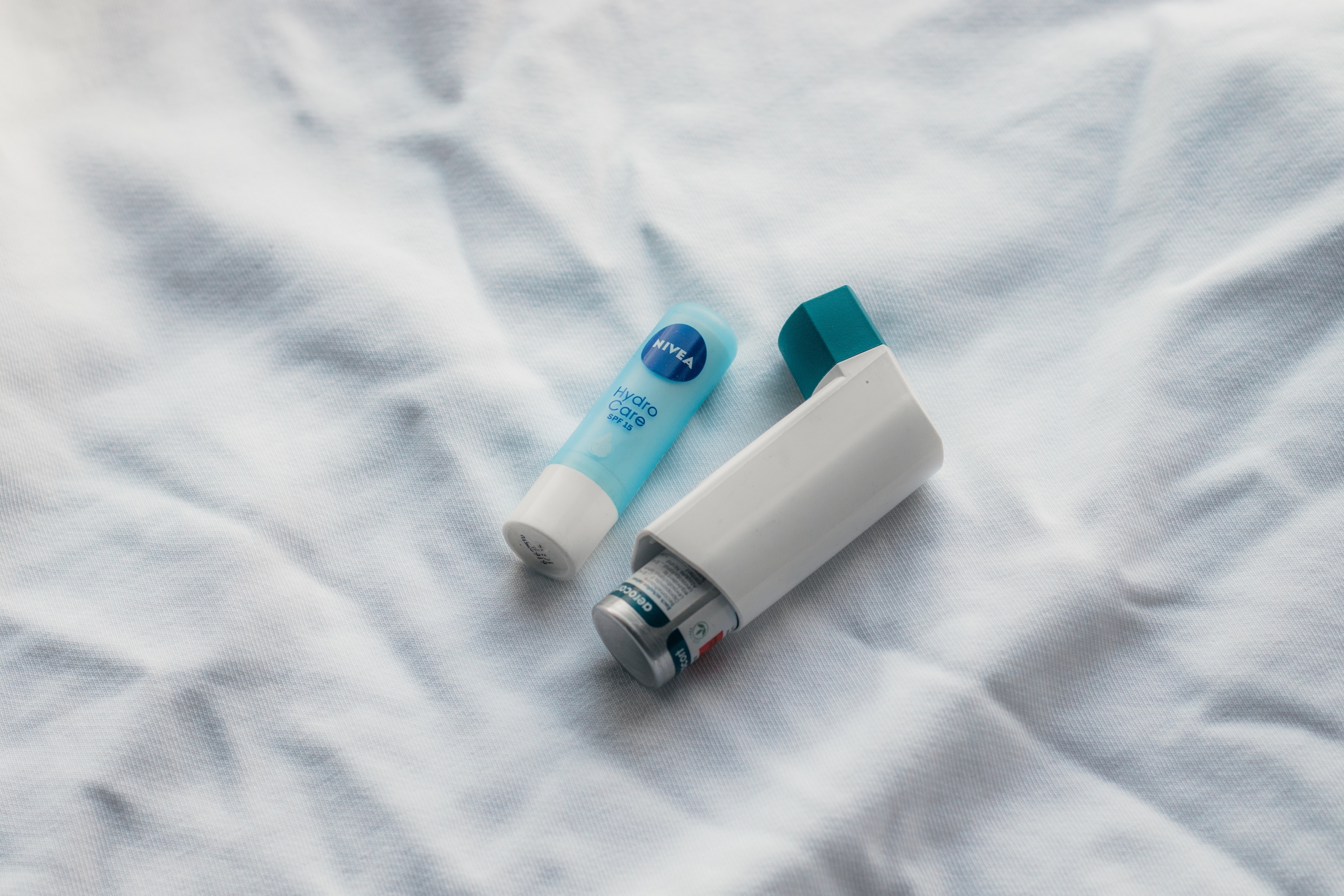 Chapstick next to inhaler