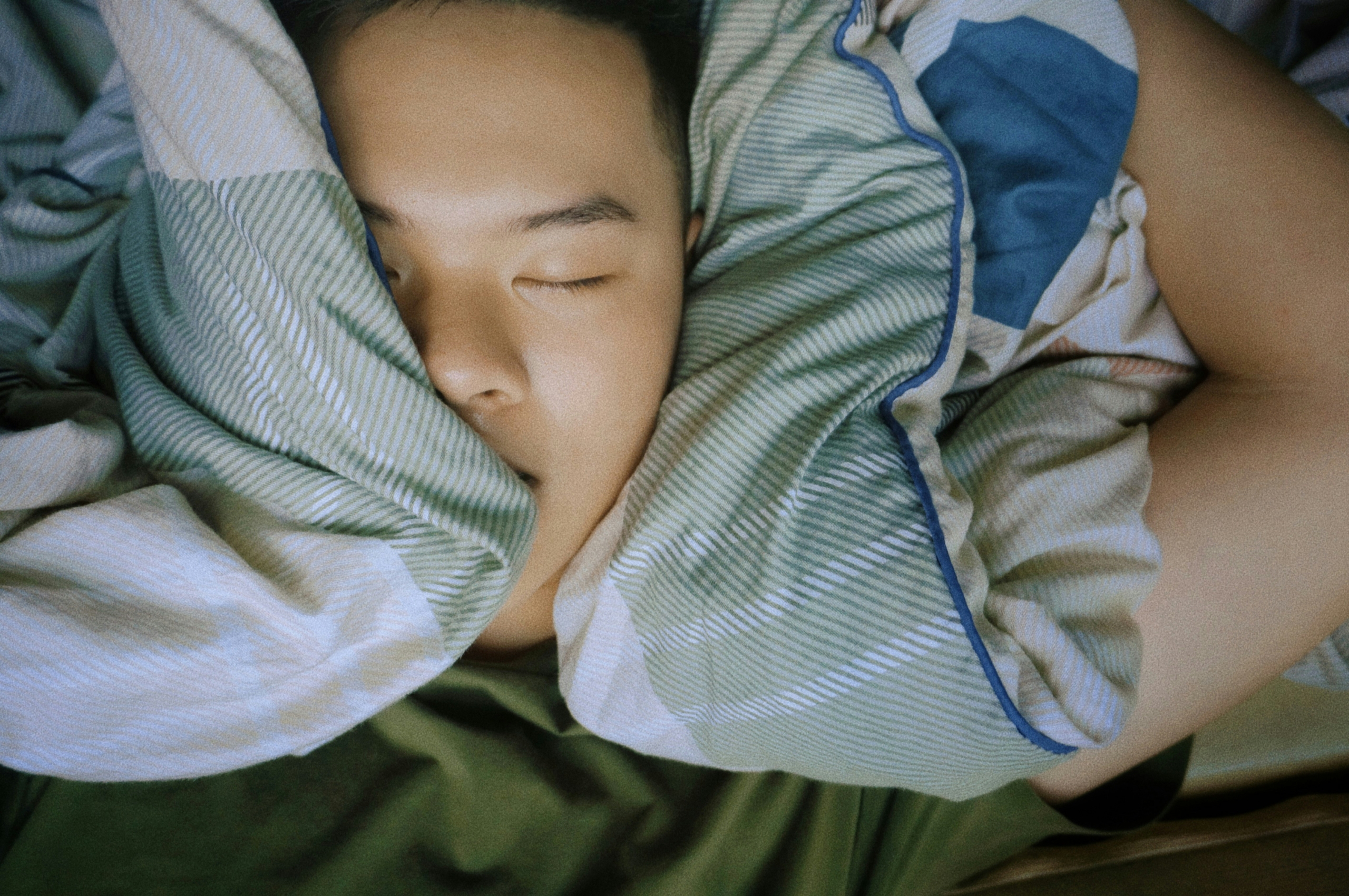 Person sleeping soundly with asthma care support in Arkansas.