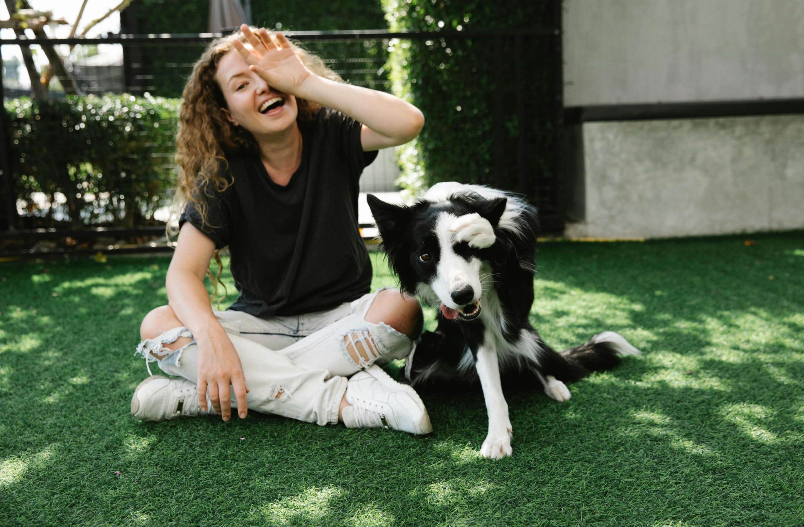 Woman with her dog enjoying allergy relief in Arkansas area
