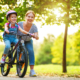 Mom teaches her daughter how to ride a bike while living allergy-free
