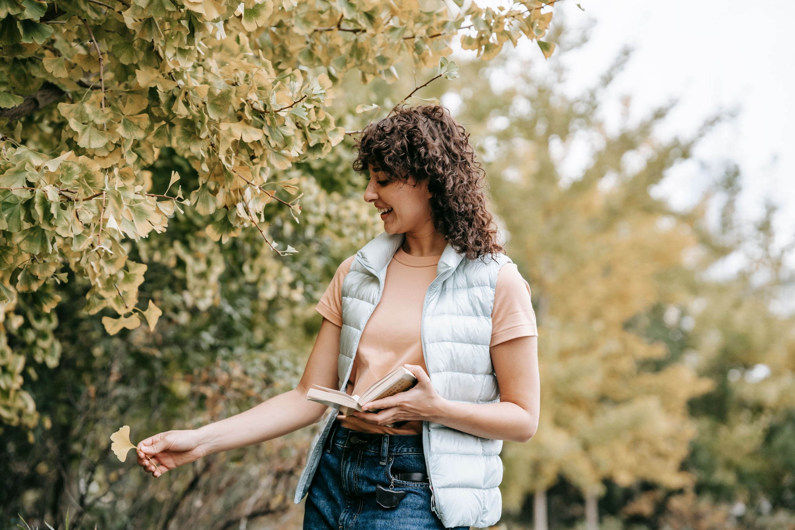 Woman enjoying the outdoors with managed asthma symptoms during fall allergy season